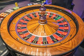 totogel88 live casino interface on mobile showing blackjack and roulette tables